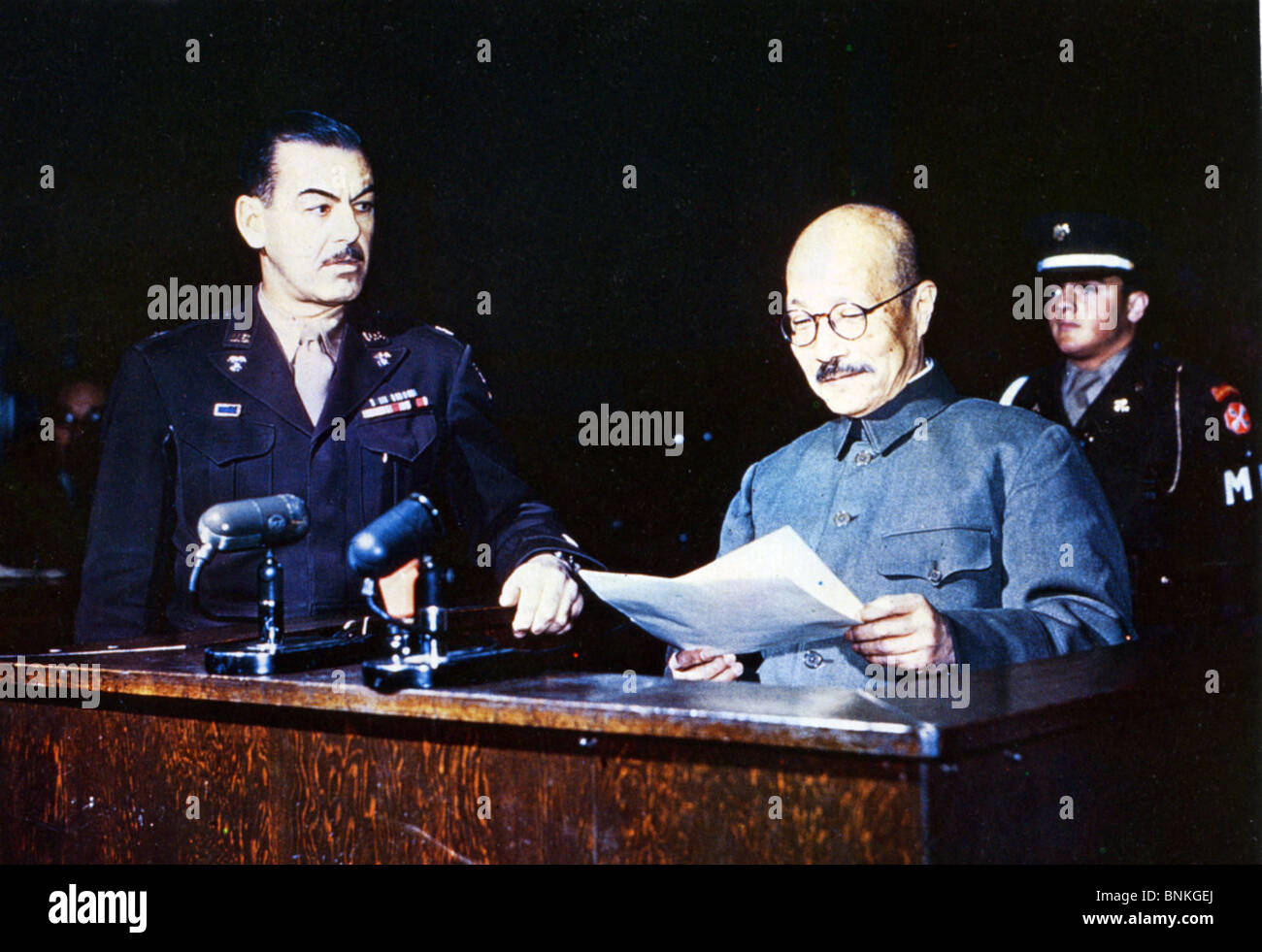HIDEKI TOJO  Japanese General and sometime Prime Minister reading his deposition during his trial in 1948. Stock Photo