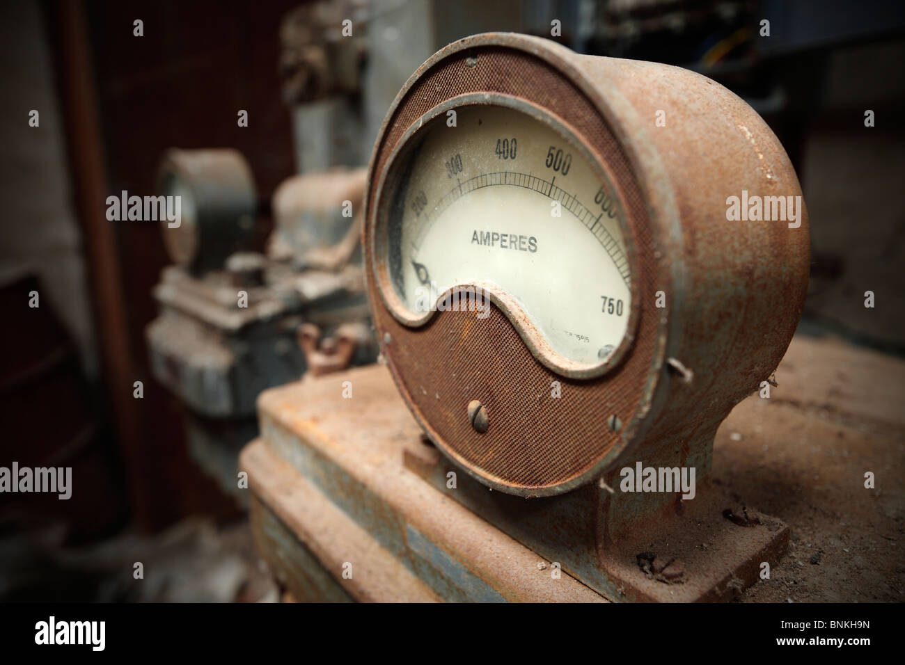 Old Industrial Amperes dial. Stock Photo