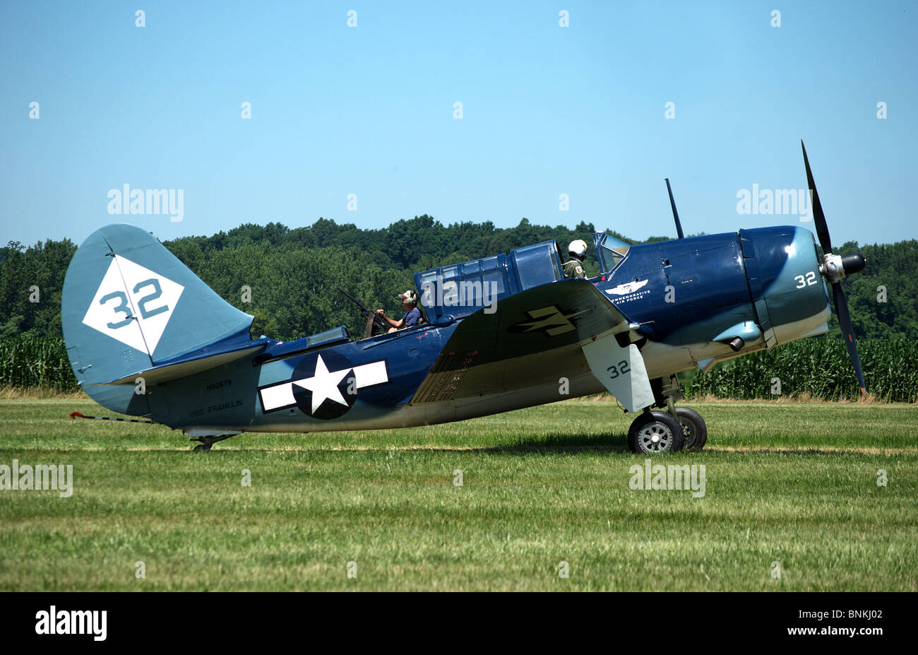 Hell Diver bomber taxis on grass runway at Geneseo Air Show 2010 Stock Photo