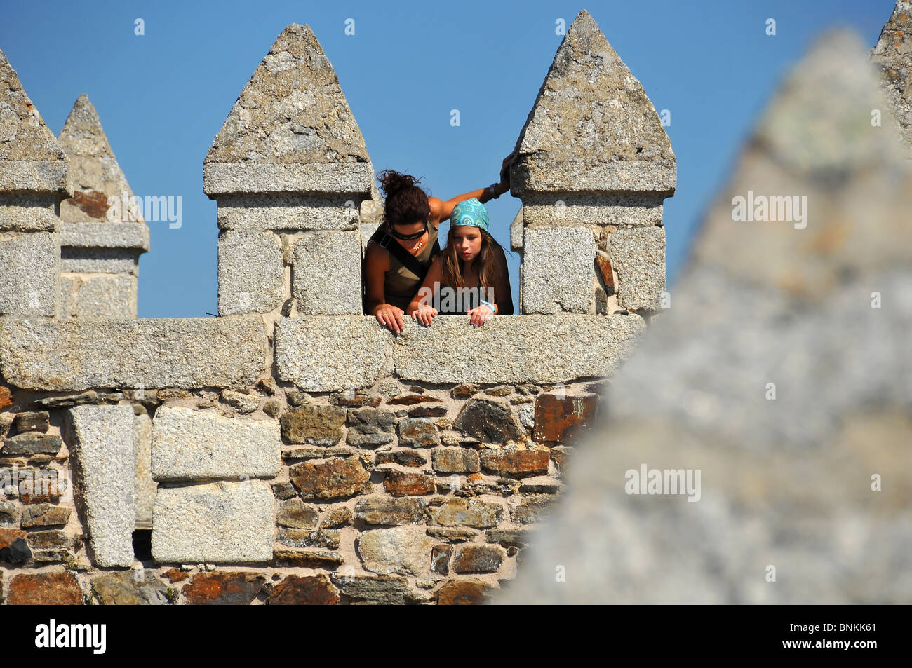 Castle Lock castle fortress fort architecture defense defence bricklayer loopholes turrets woman wife . Girls mother daughter Stock Photo