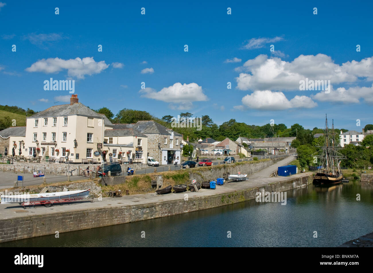 Sailing ship and other boats at old harbour Charlestown nr St. Austell Cornwall England Stock Photo