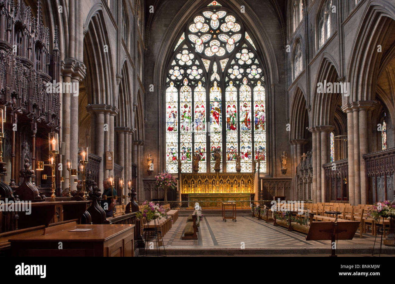 Choir stalls, altar and east window of Ripon Cathedral, north Yorkshire Stock Photo