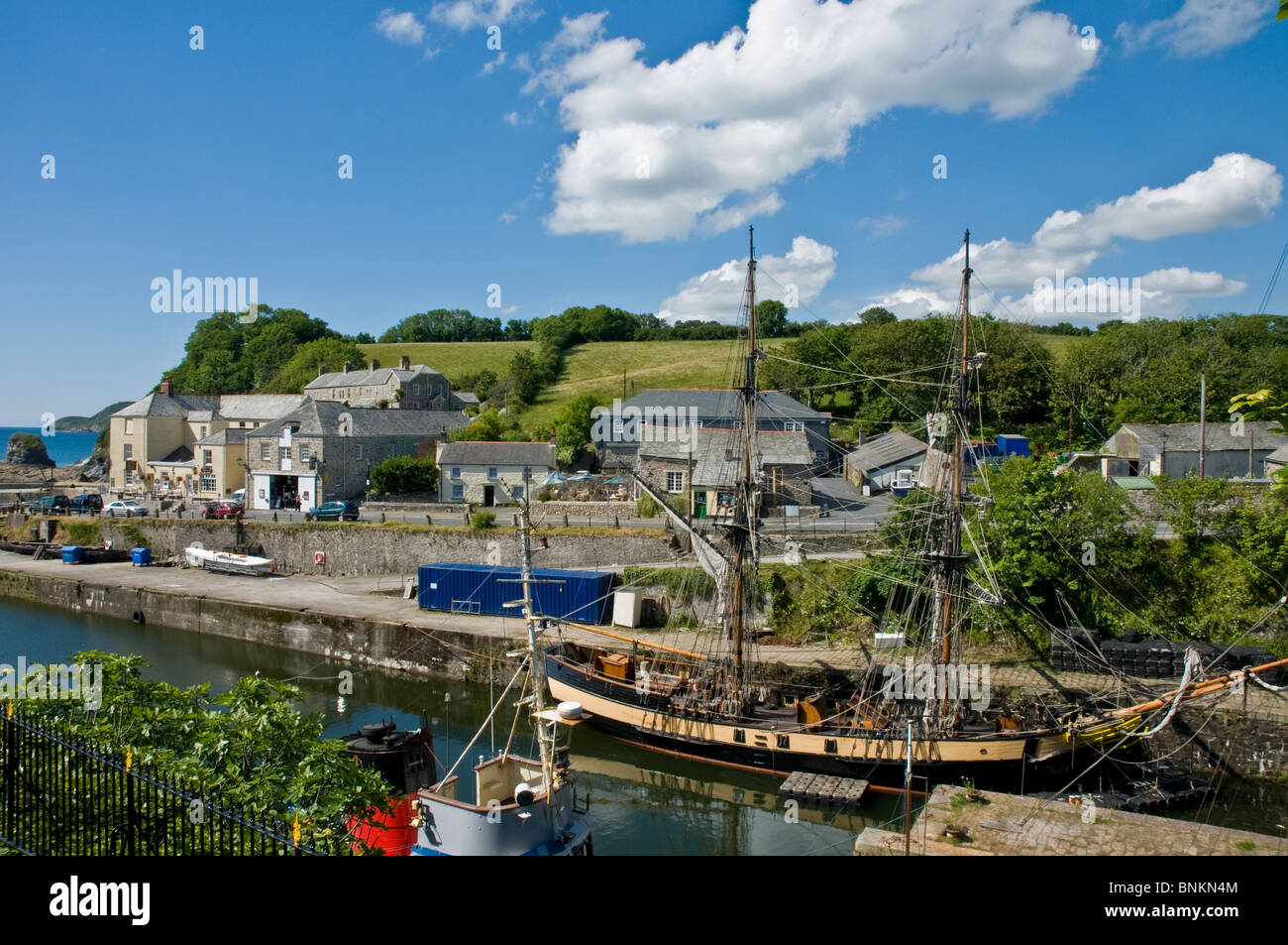 Sailing ship and other boats at old harbour Charlestown nr St. Austell Cornwall England Stock Photo