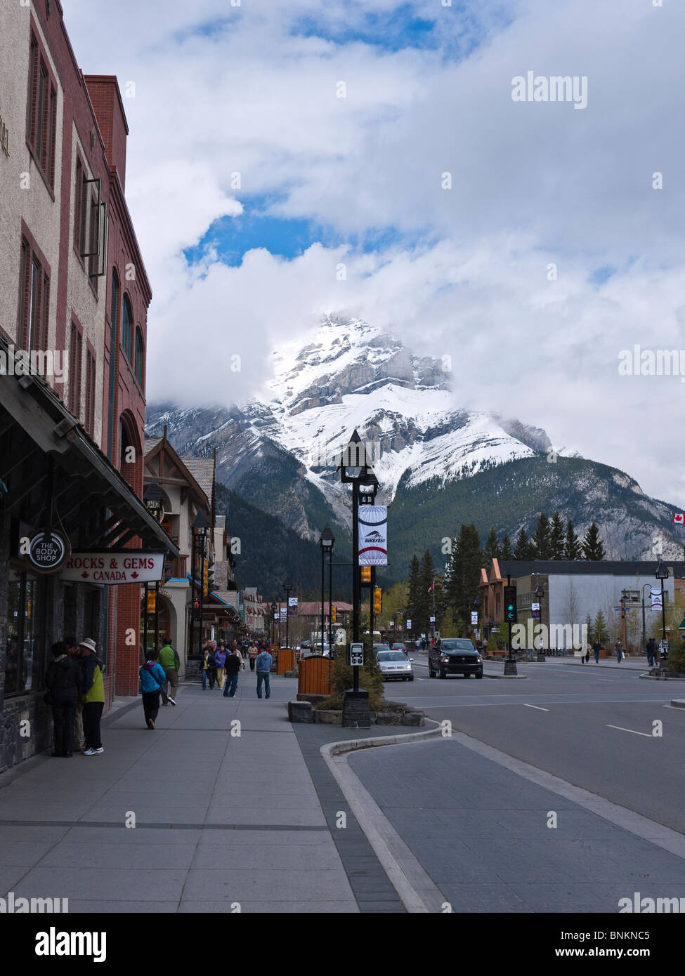 View of Banff Avenue with Cascade Mountain in the background. Downtown Banff Alberta Canada Stock Photo
