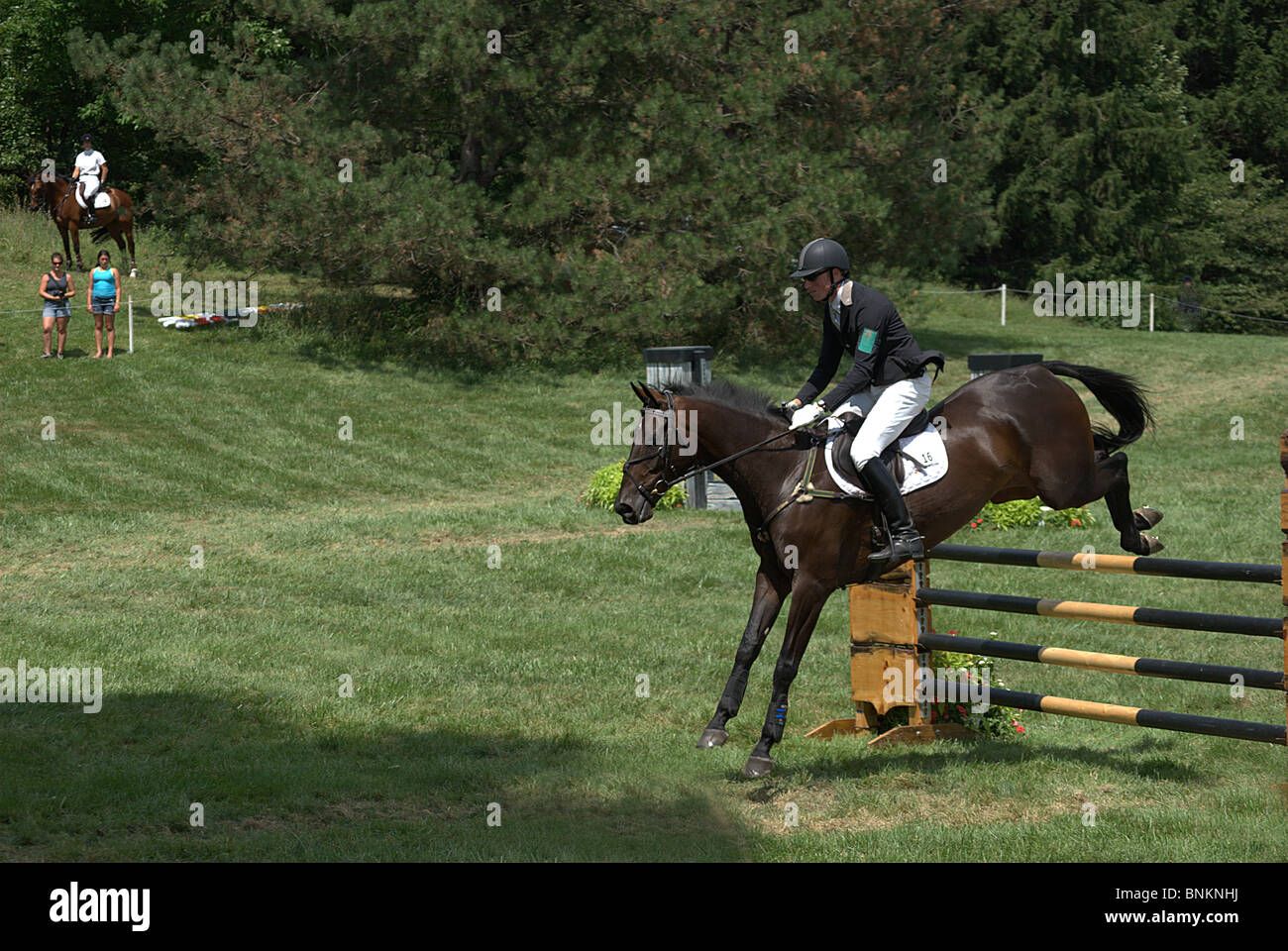 Horse and rider jump fence at Stuart Horse Trials 2010 in Show Jumping ...