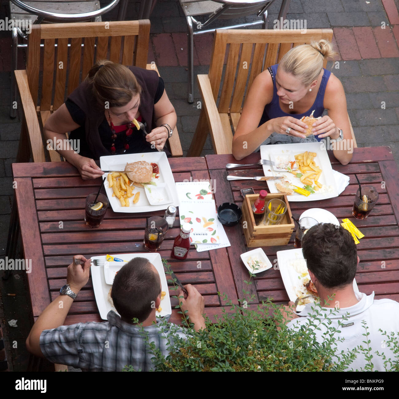 People eating lunch in Birmingham City Centre, West Midlands England UK Stock Photo