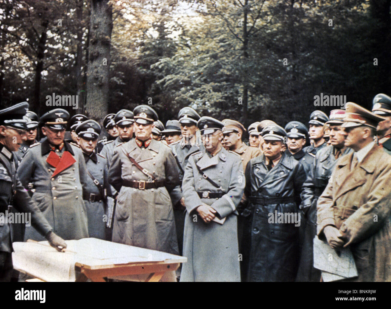 HEINRICH HIMMLER (centre wearing glasses) in Austria in 1939 with Hitler at right and Reinhard Heydrich fourth from right Stock Photo