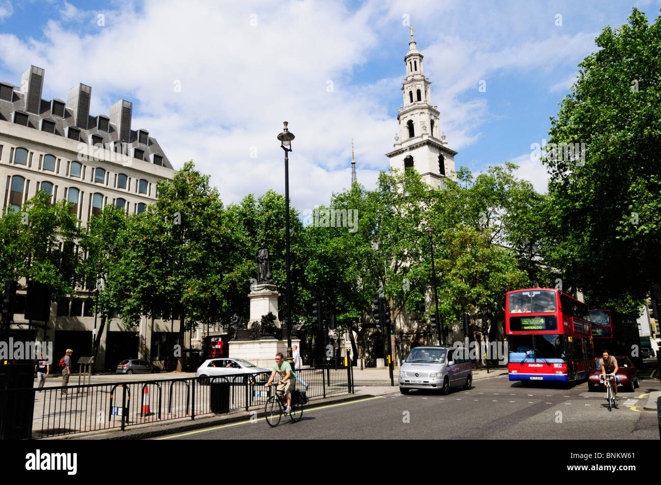 Street scene in The Strand near Aldwych  with Church of St Mary le Strand London England, UK Stock Photo