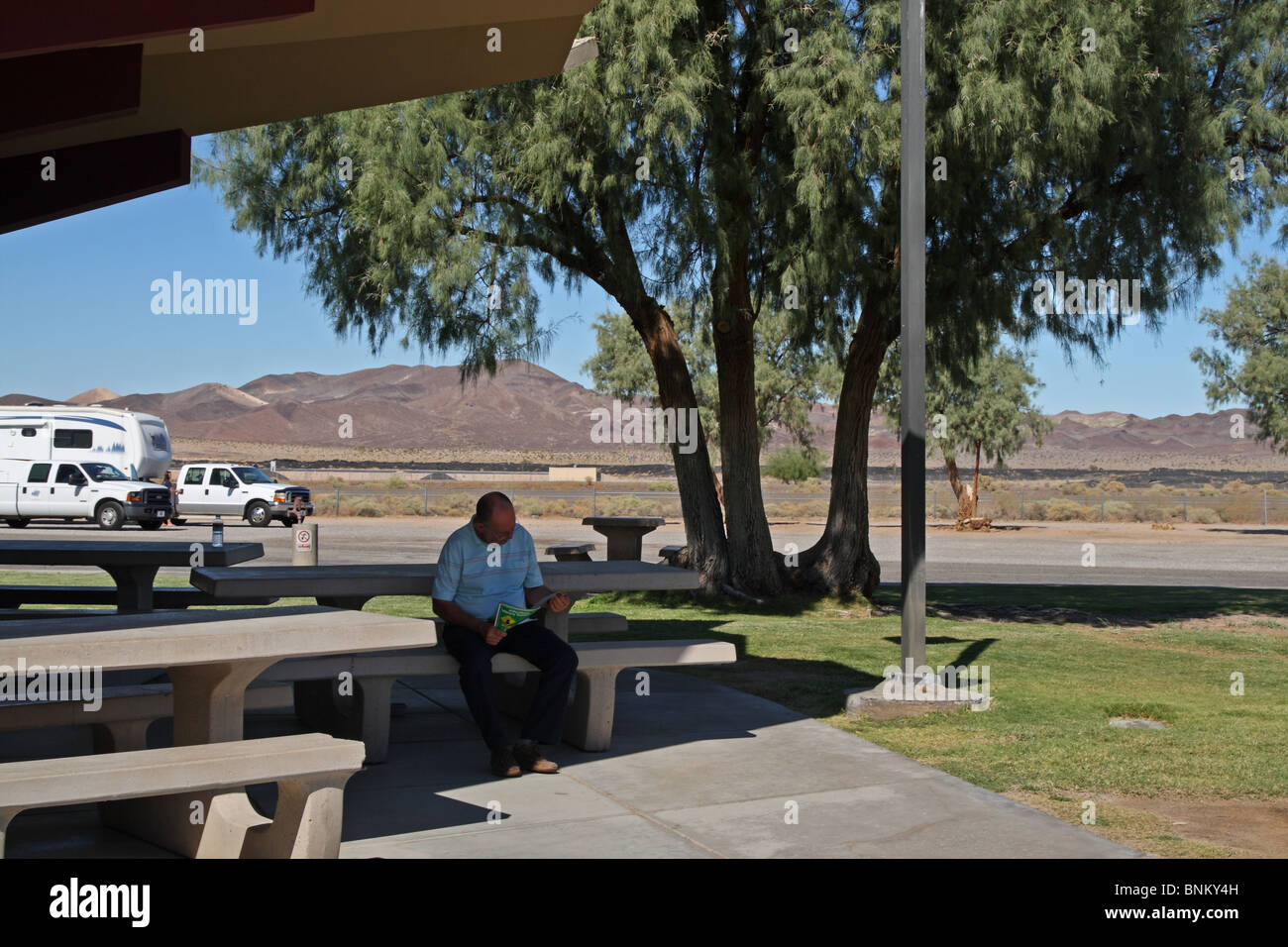 Rest Area, California, USA. Man reading a magazine Stock Photo Alamy
