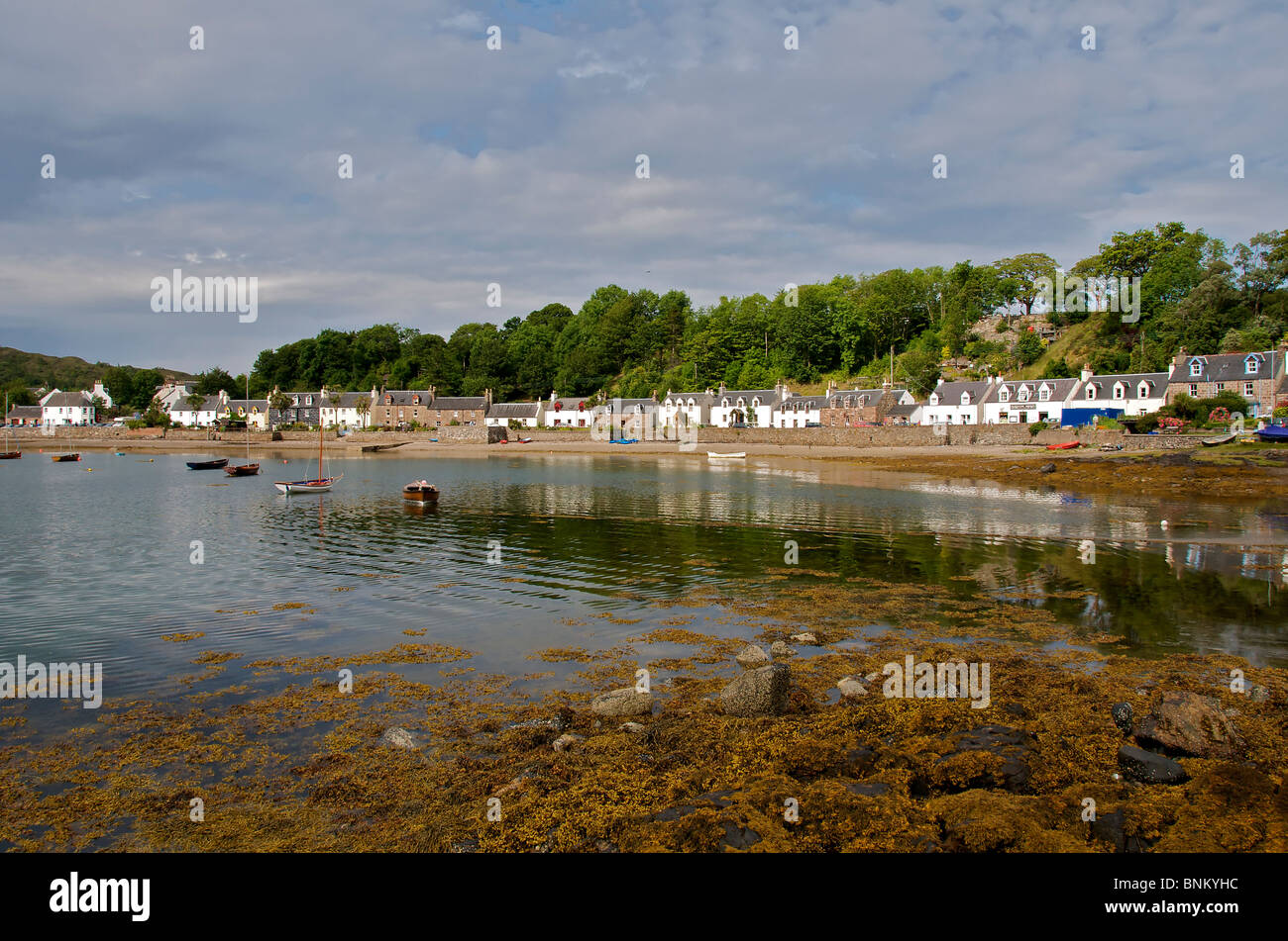Waterfront houses at low tide Plocton Wester Ross, Ross and Cromarty Scottish Highlands North West Scotland Stock Photo