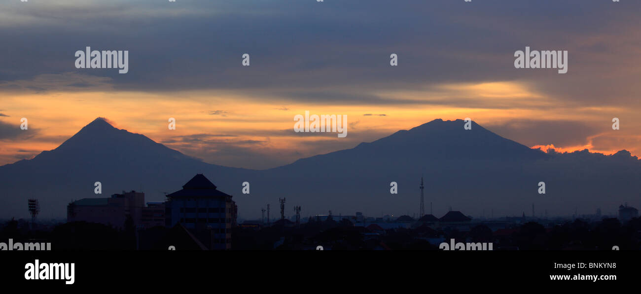 Indonesia, Java, Gunung Merapi and Gunung Merbabu volcanoes, sunset; Stock Photo