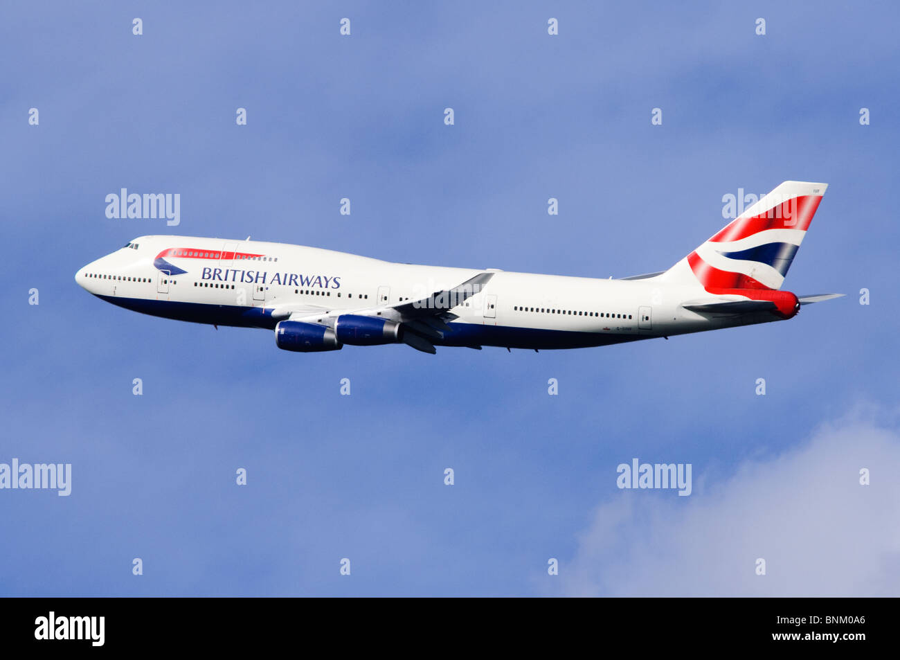 Boeing 747 operated by British Airways in flight after departure from London Heathrow Airport, UK. Stock Photo