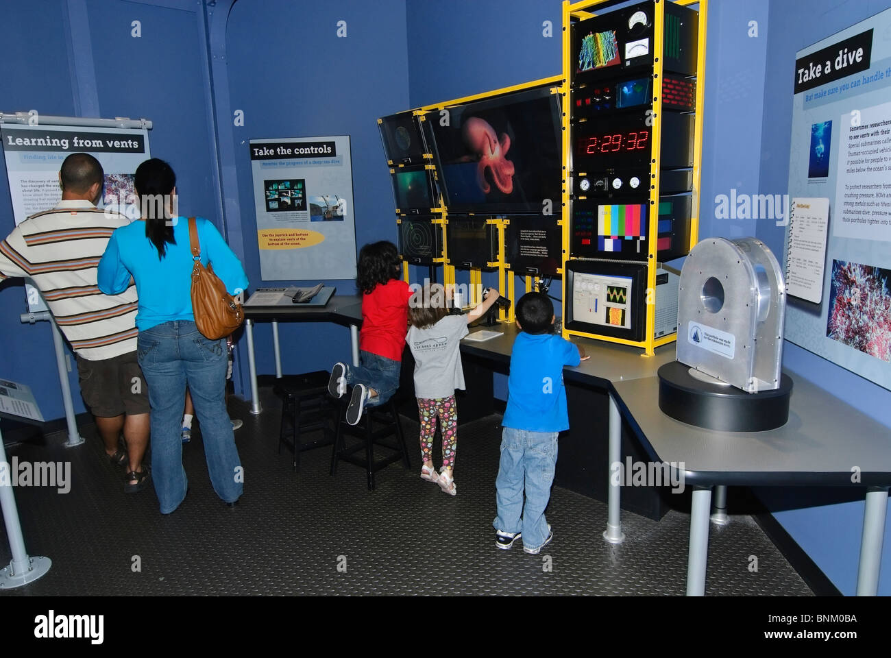Guests interacting with the Extreme Zone exhibit at the California Science Center's Ecosystems wing. Stock Photo