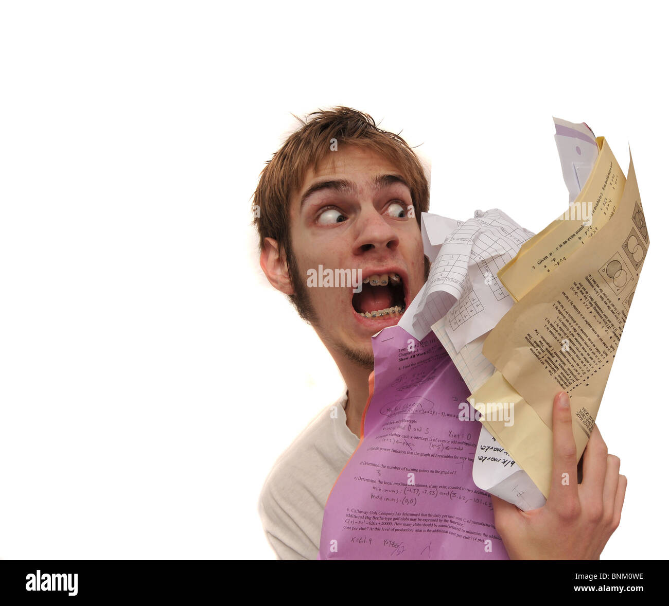 Man being attacked by an overload of paperwork! Stock Photo