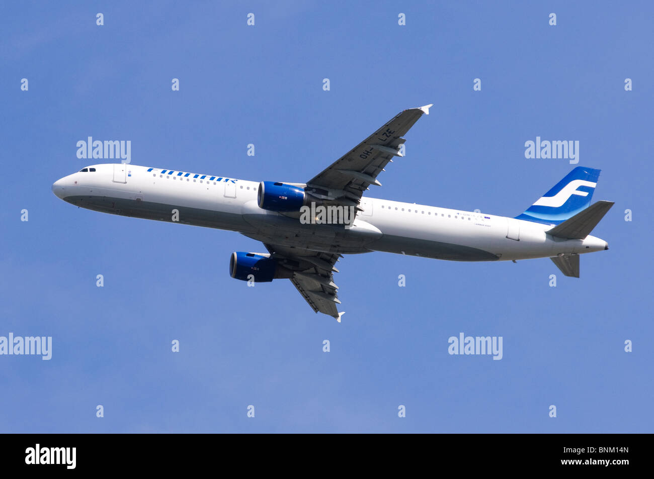 Airbus A321 operated by Finnair climbing out after take off from London Heathrow Airport, UK. Stock Photo