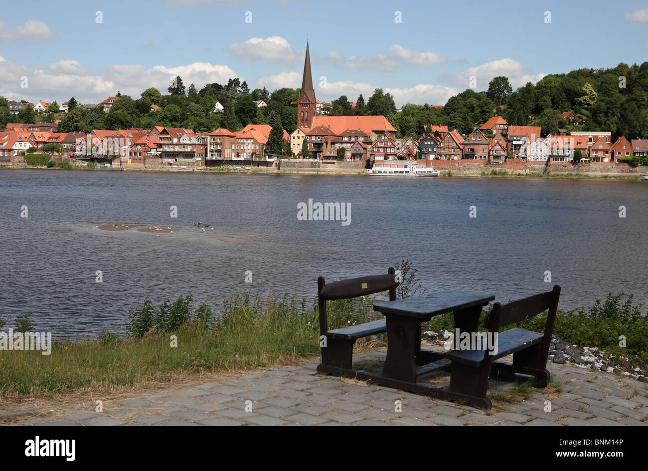 The German town Lauenburg seen from across the river Elbe, taken from the Elbe cycle path or Elberadweg. Stock Photo