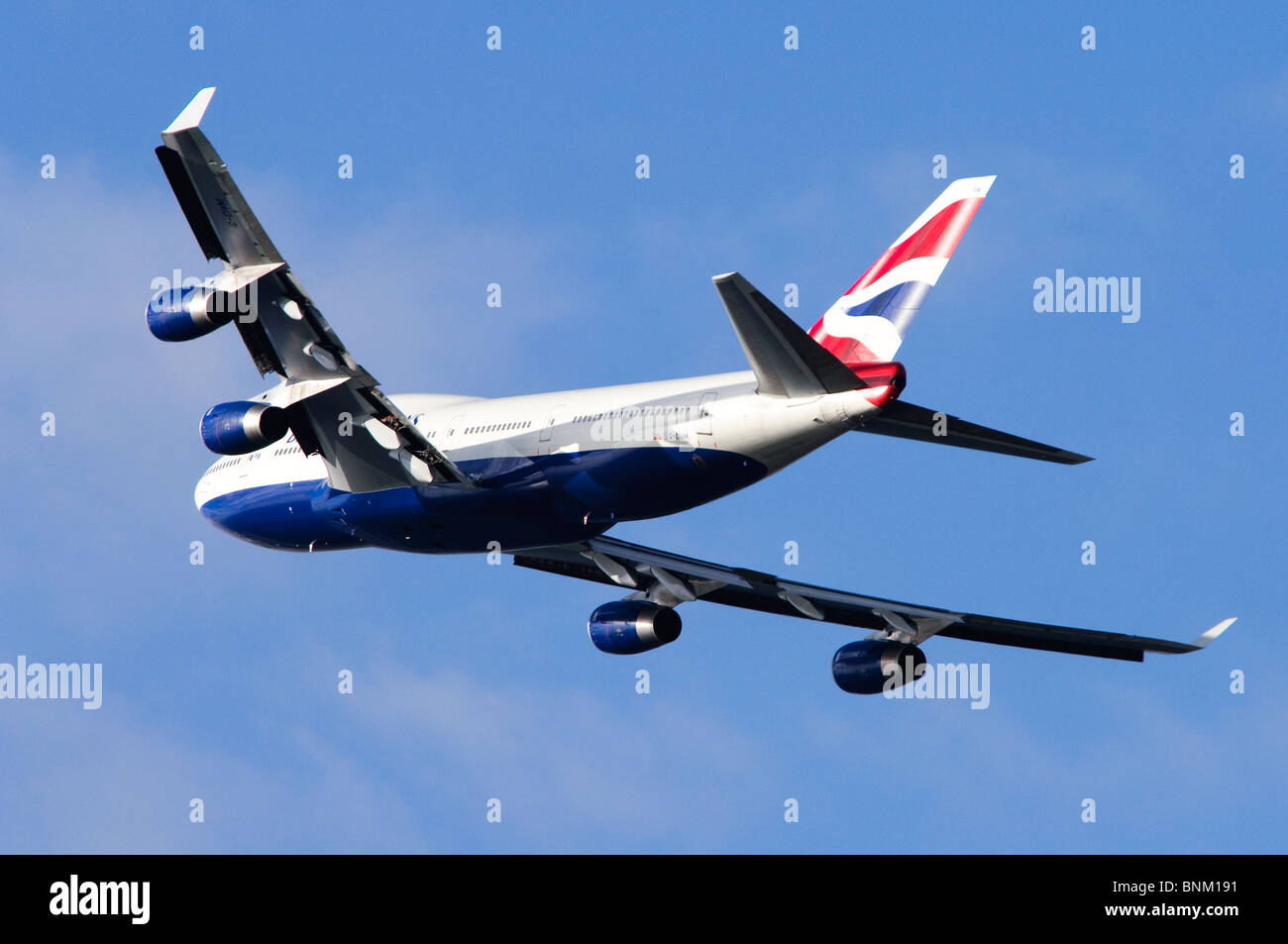 Boeing 747 operated by British Airways climbing out from take off at London Heathrow Airport, UK. Stock Photo