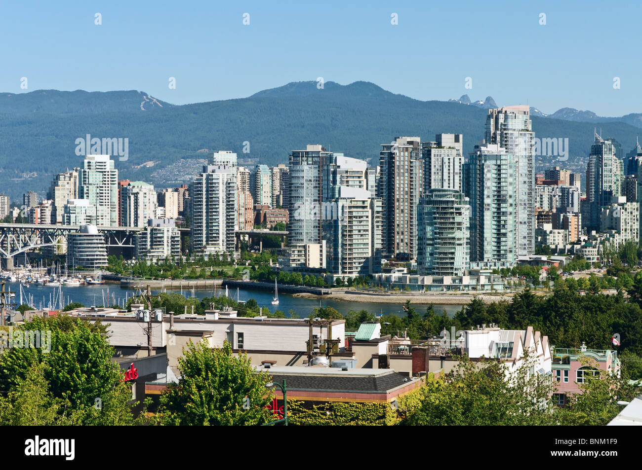 A view of the Vancouver skyline from the south side of False Creek. Stock Photo