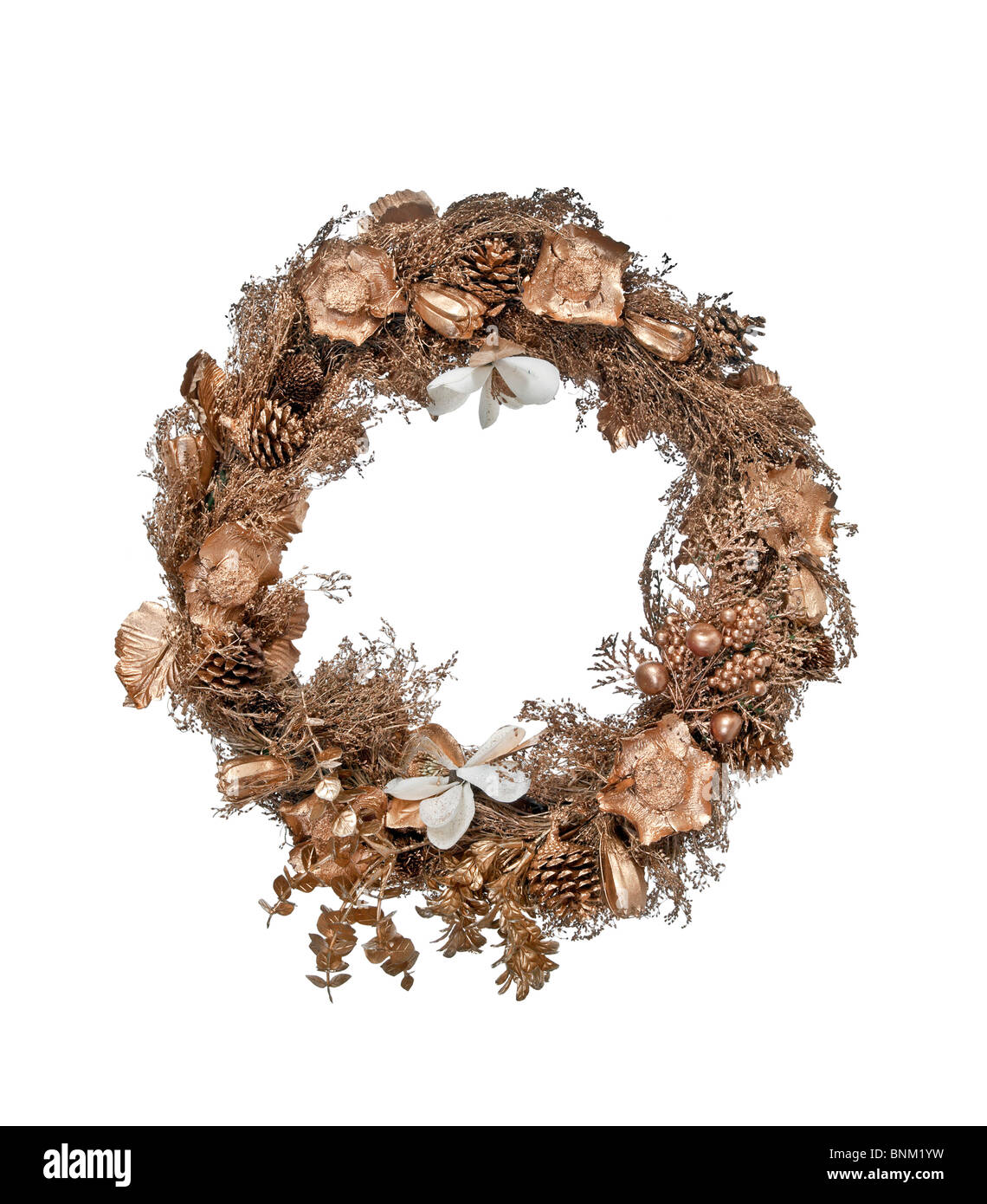 Decorative golden Christmas reef with woven natural materials. Stock Photo