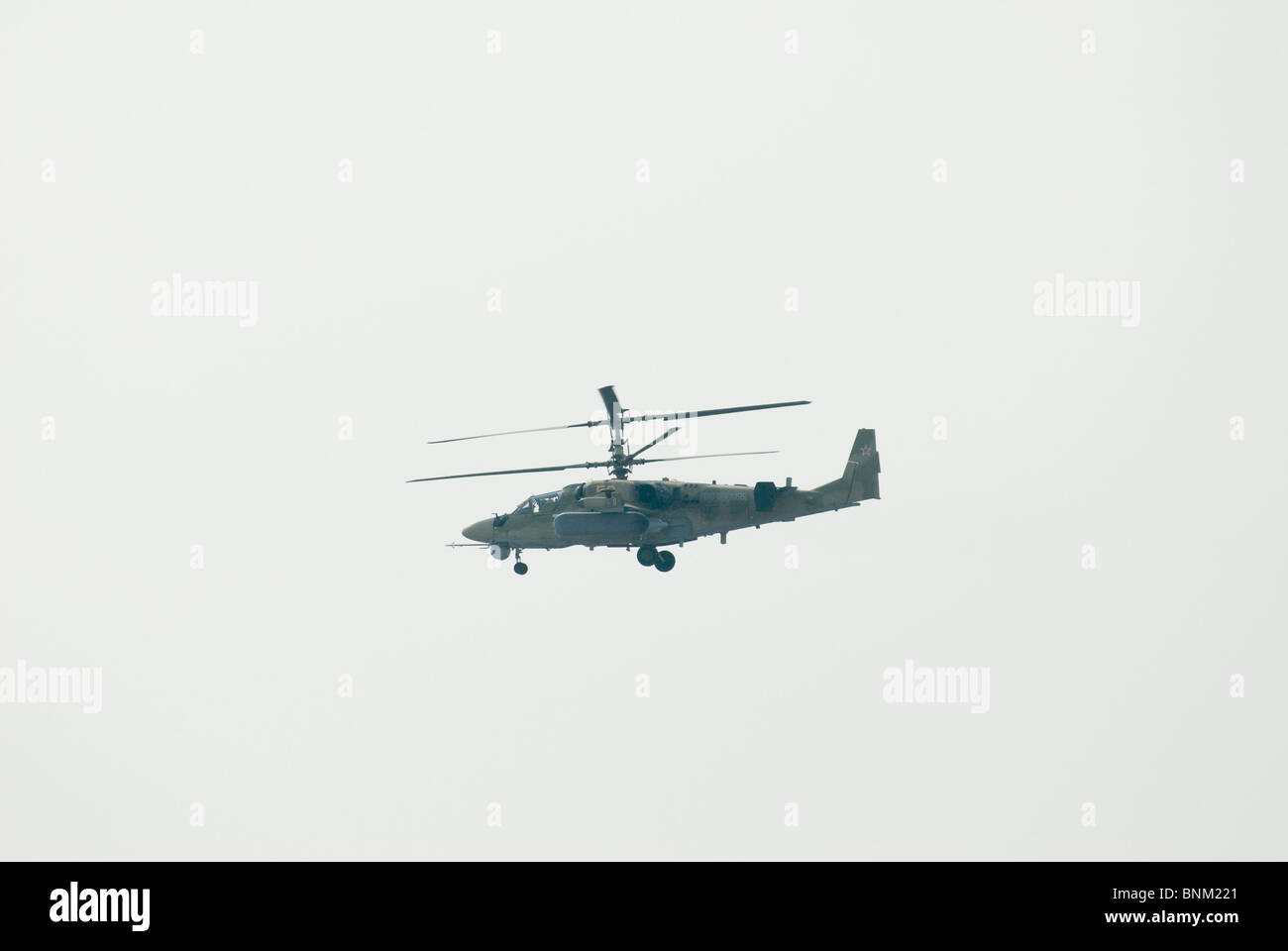 Russian military helicopters flying hi-res stock photography and images ...