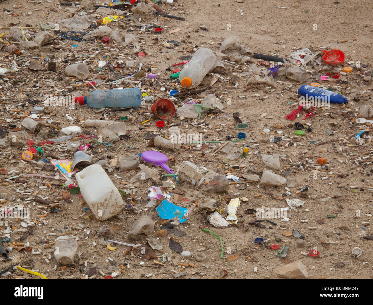 https://c8.alamy.com/comp/BNM249/beach-pollution-by-plastic-and-trash-BNM249.jpg