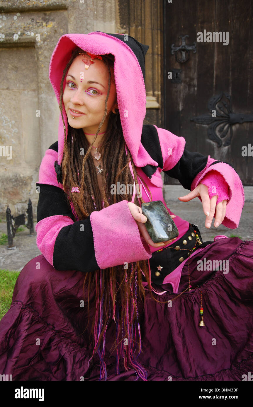 pink hooded fairy in Glastonbury United Kingdom Stock Photo