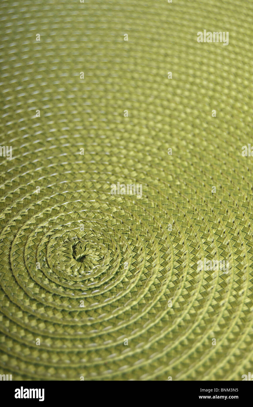 Circular place mat background. Close up of a dinner placemat. Stock Photo