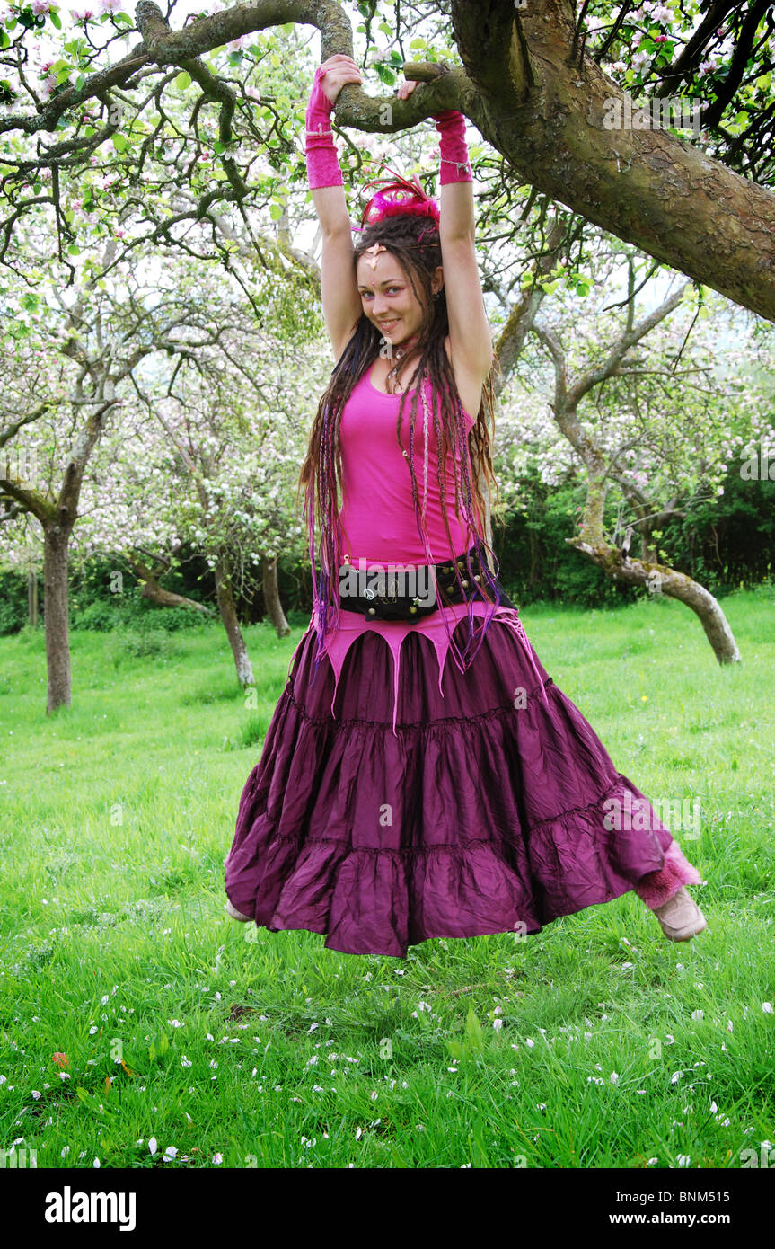 Pink fairy in apple orchard Glastonbury Somerset UK Stock Photo