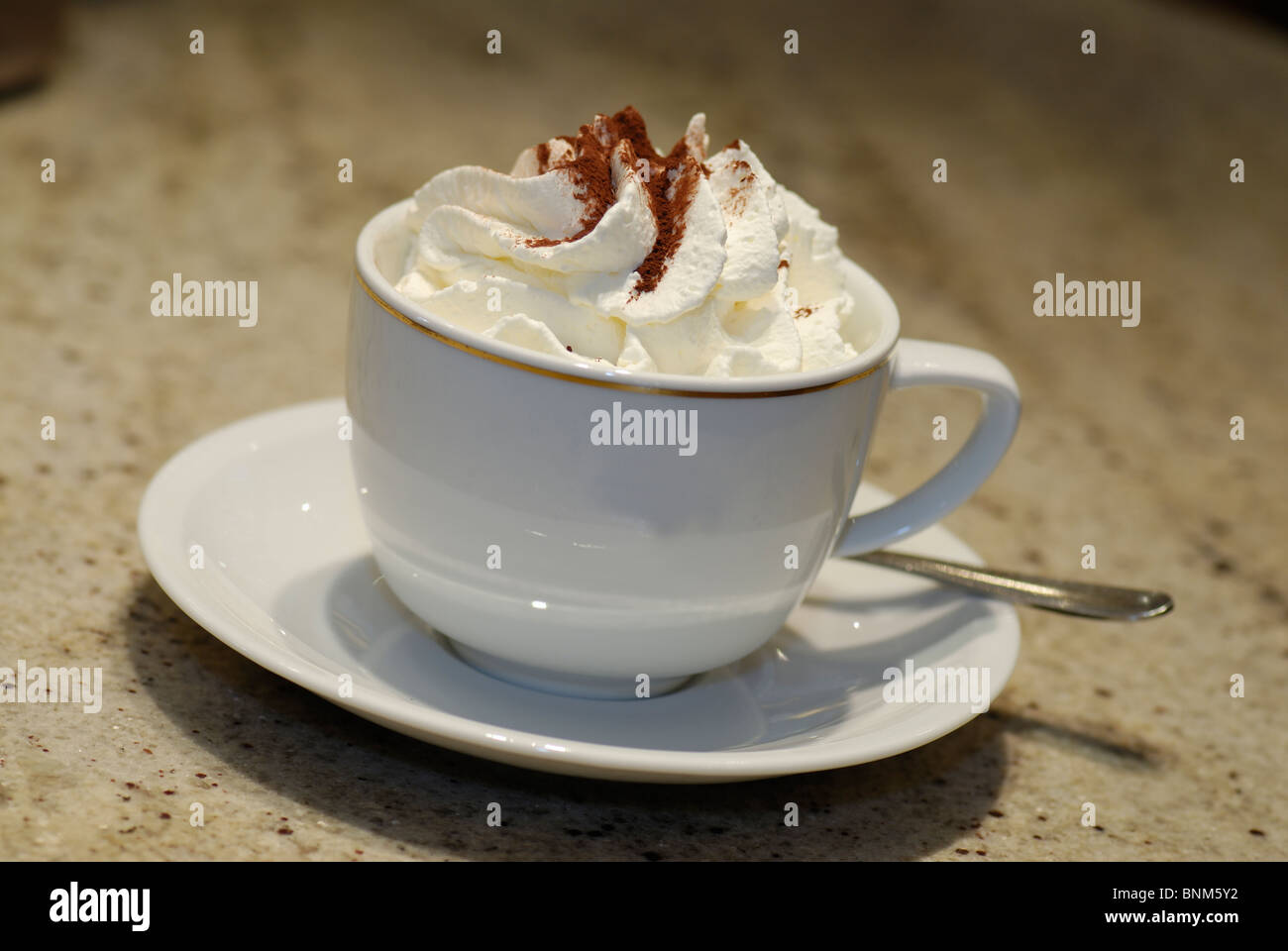 cup of cappuccino with cream Stock Photo