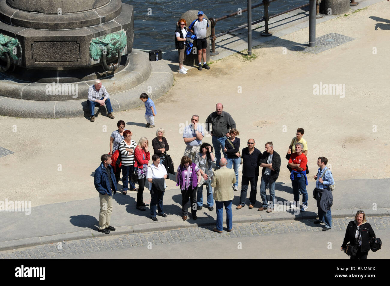 Tourists listening to guide at Deutsche Eck at Koblenz Germany Deutschland Europe Stock Photo