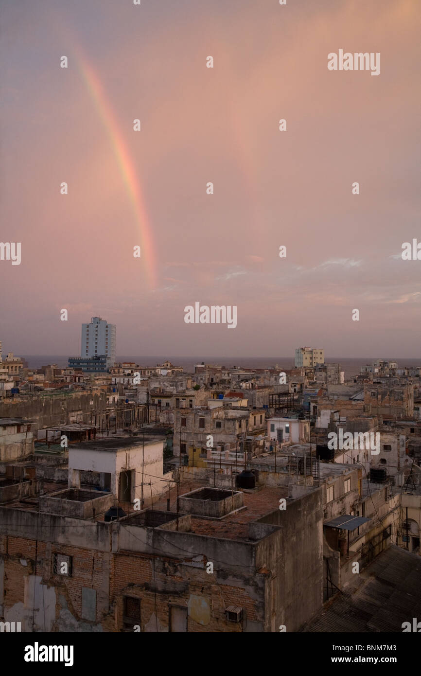 An early morning view across the city of Havana with rainbow in the sky, Havana, Cuba Stock Photo