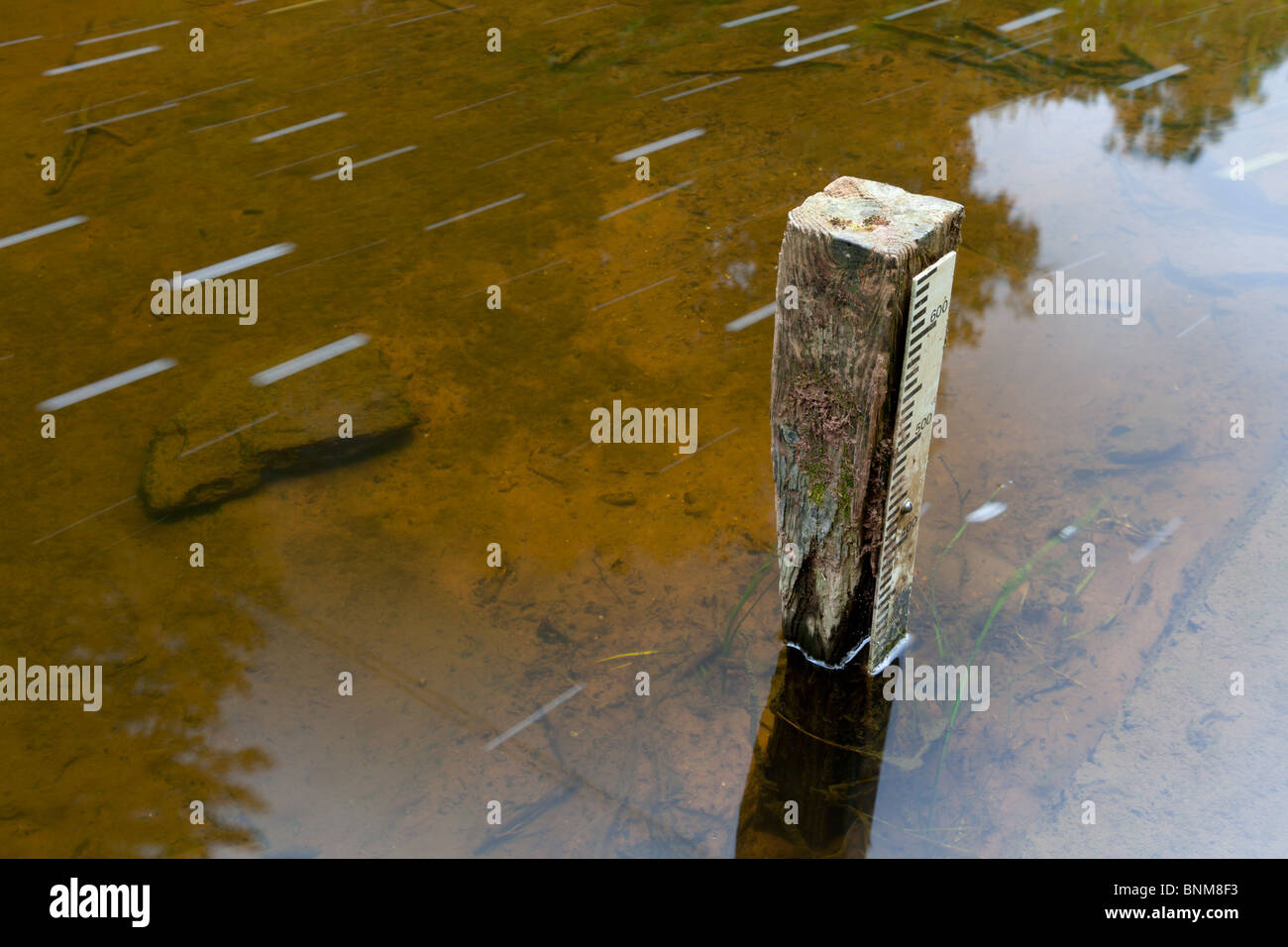 A river level gauge in the river Blackadder, Scottish Borders Stock Photo