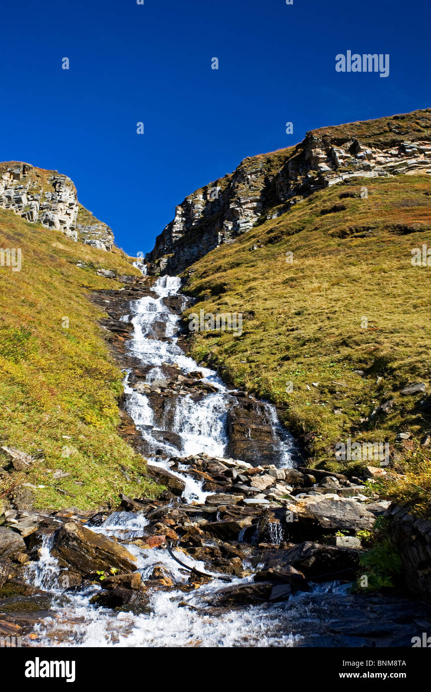 Austria Grossglockner pass high-level brook cliff alpine holidays travel, Stock Photo