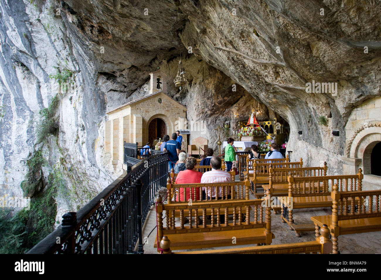 Spain Asturias Covadonga cave cliff visitor benches seats holidays ...