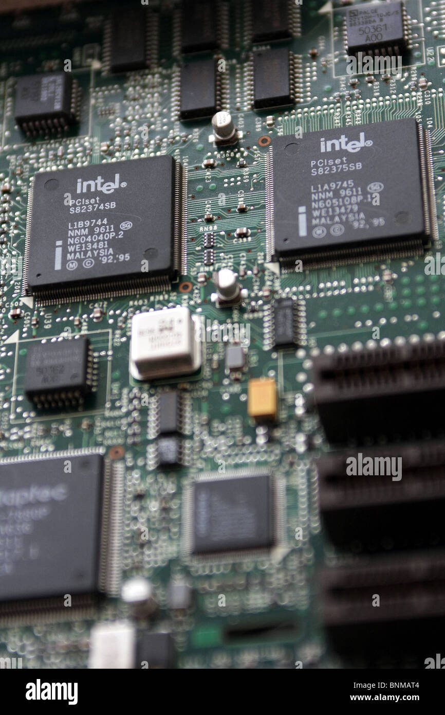 Computer PCB with two Intel PCI CPU control chips surface mounted on the Printed Circuit Board Stock Photo