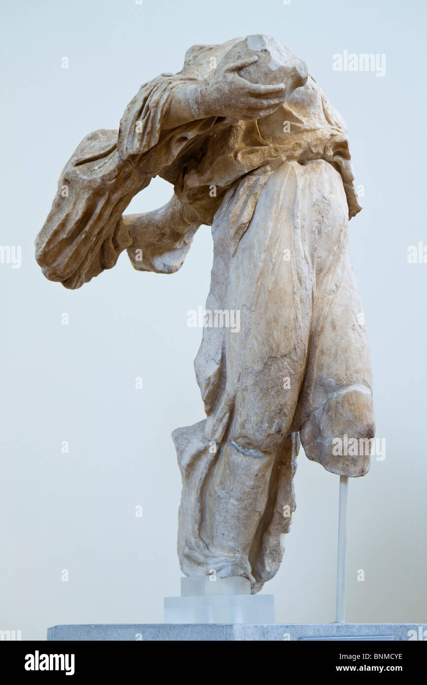 Statue of Nike holding a dove. Central akroterion from the Temple of  Asklepios at Epidauros, ca. 380-370 BC. Attr. to Timotheos Stock Photo -  Alamy