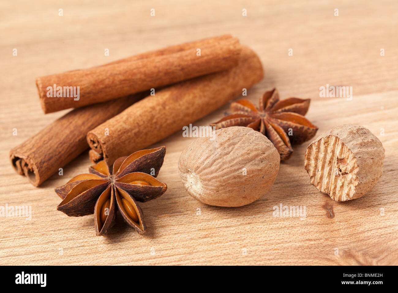 cinnamon,anise and nutmeg on wooden table Stock Photo