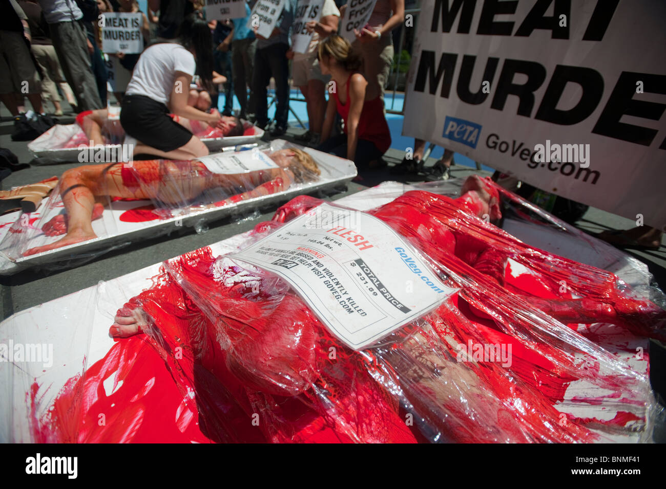 Activists from the animal rights group PETA protest the slaughter of