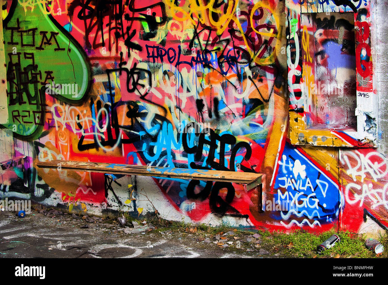 a urban city scene with lots of graffiti tags Stock Photo