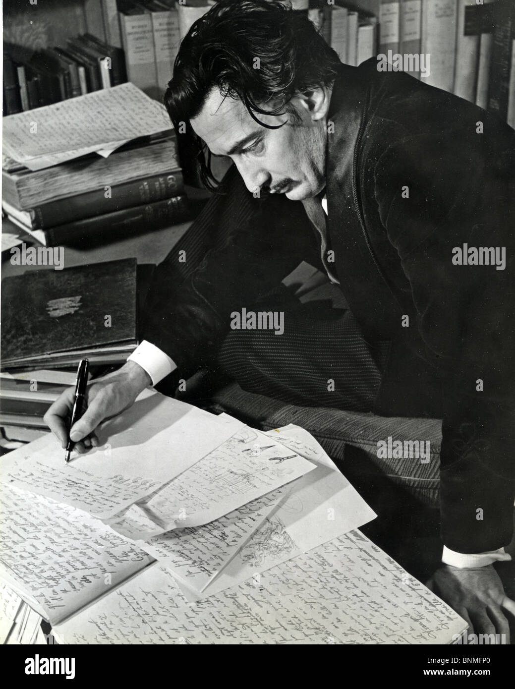SALVADOR DALI (1984-89) Spanish artist writing his autobiography in 1940. See Description below Stock Photo