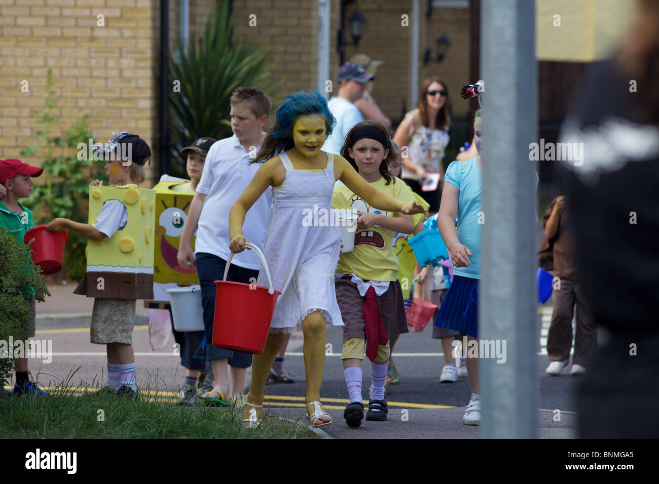 Children collecting money at Biggleswade carnival, Bedfordshire, England Stock Photo