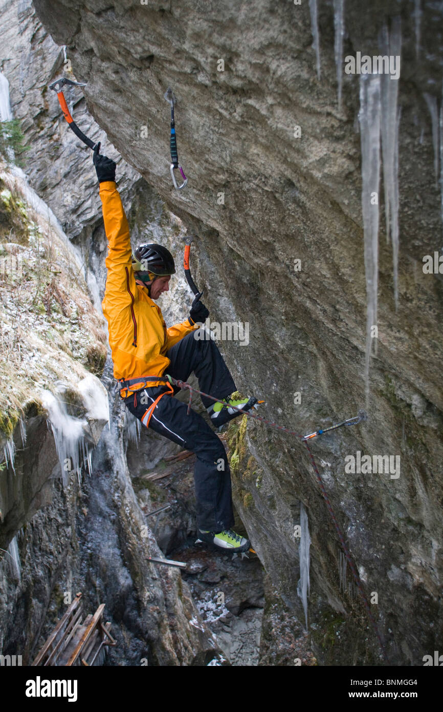 Ice climbing sport pick picks cliff man Sigmund Thun gorge climb sport Alps  climbing technology ice cape run Austria Stock Photo - Alamy