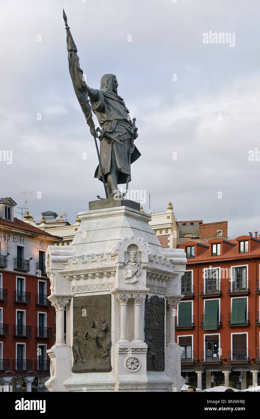 Statue of Count Ansurez in the main square, founder of the city of Valladolid with scenes of bronze embossed quixote on the square pedestal, Spain Stock Photo