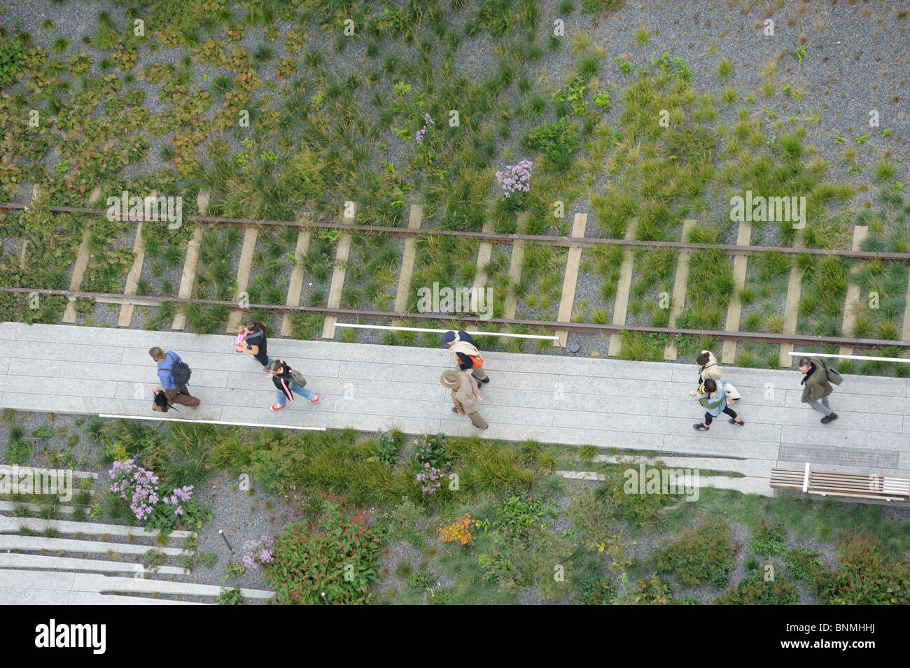 pedestrians from above high line walking green Meat Packing District Manhattan New York City New York USA America North America Stock Photo