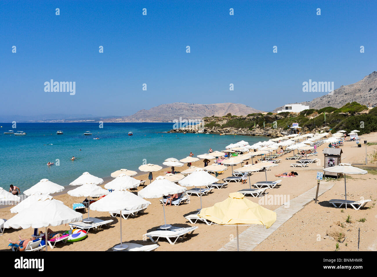 Beach at Pefkos, near Lindos, Lardos Bay, Rhodes, Greece Stock Photo