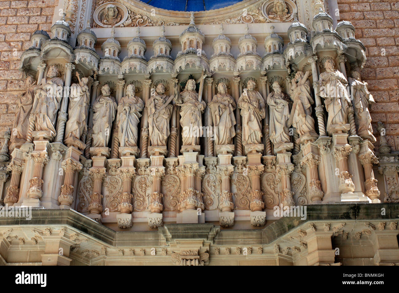 Carved statues on the Abbey at Montserrat (serrated mountain) west of Barcelona, in Catalonia, Spain. Stock Photo