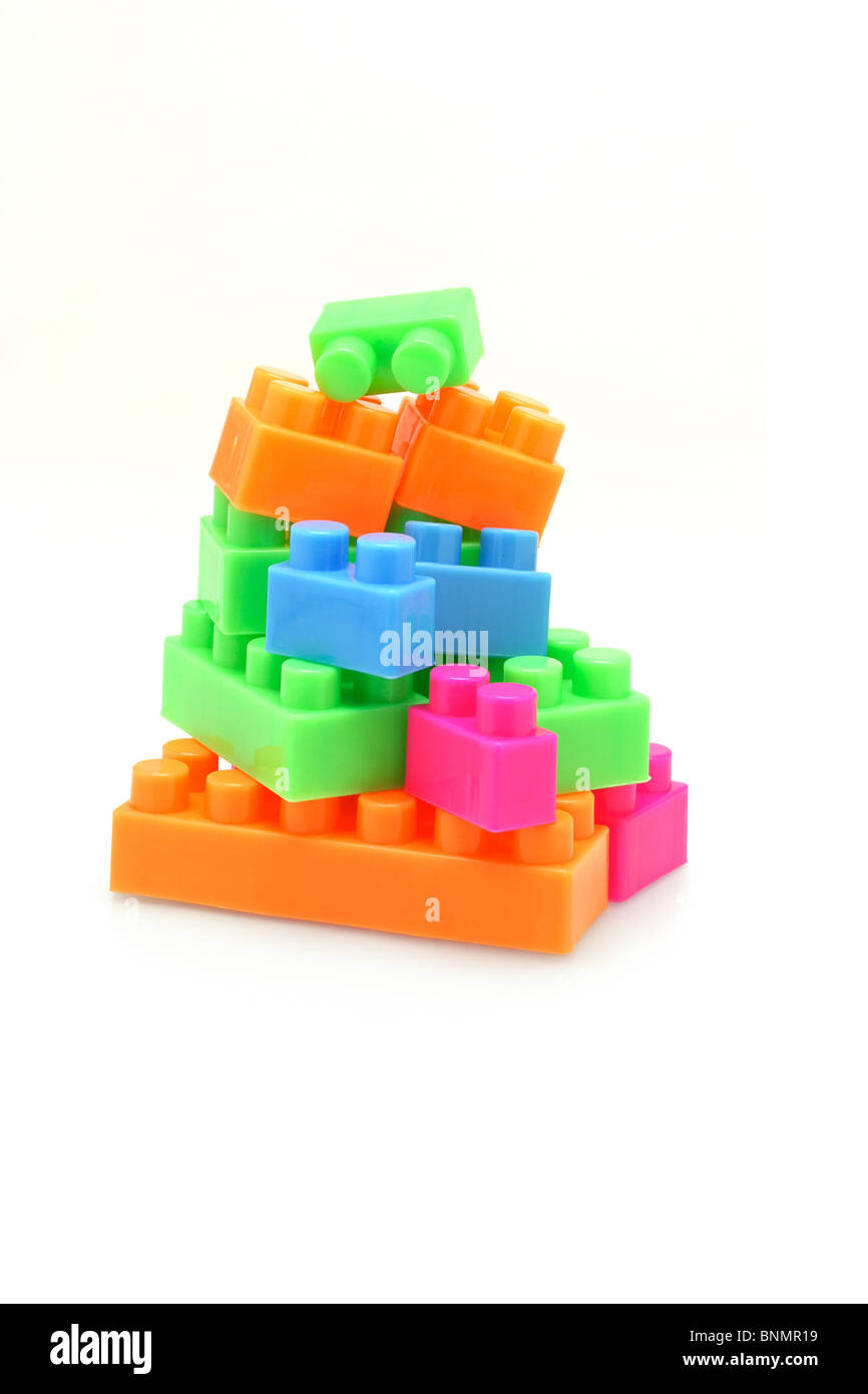 Stack of colorful building blocks on white background Stock Photo