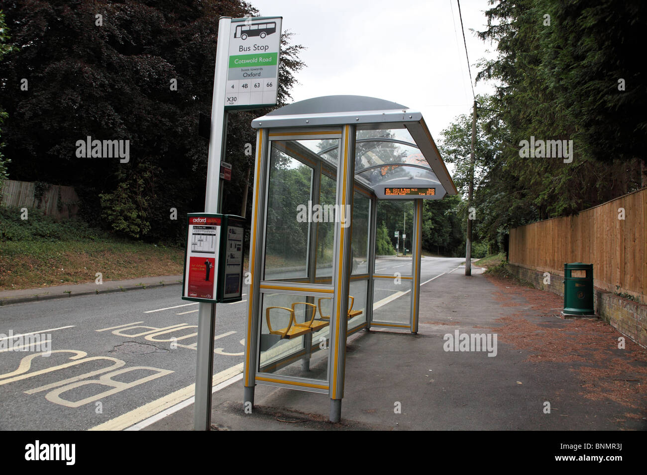 Bus stop with Electronic timetable Stock Photo Alamy