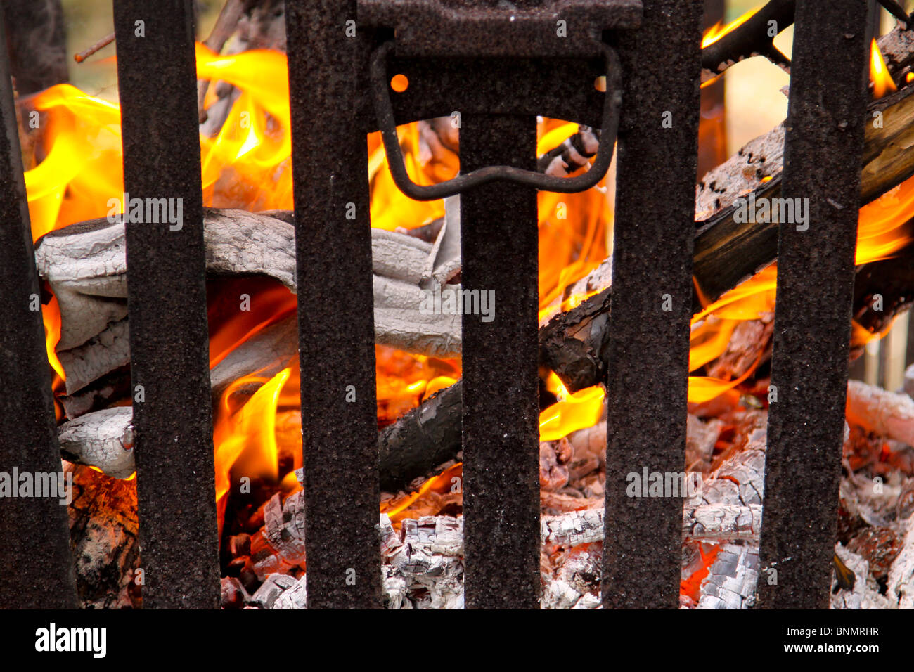 Burning of garden waste in a fire basket Stock Photo Alamy