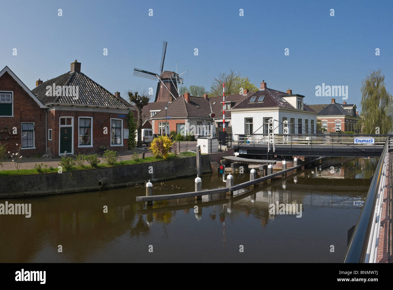 Netherlands Holland Drenthe Enumatil City Village Water Spring panorama Windmill Eben Haëzer Stock Photo